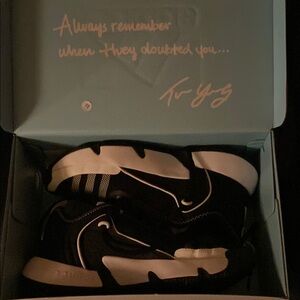 Adidas black and white edition shoes.